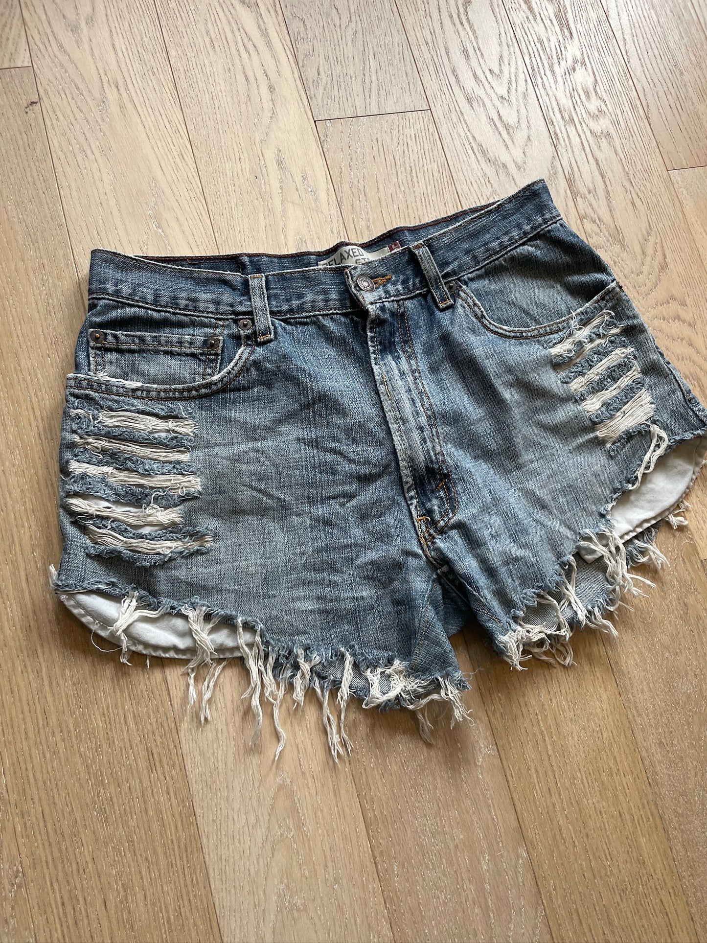 Vintage Levi’s Ripped Denim Shorts